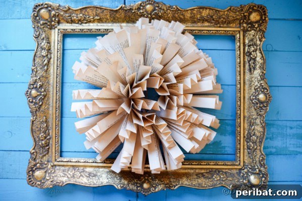 Paper flower wall art on blue wall