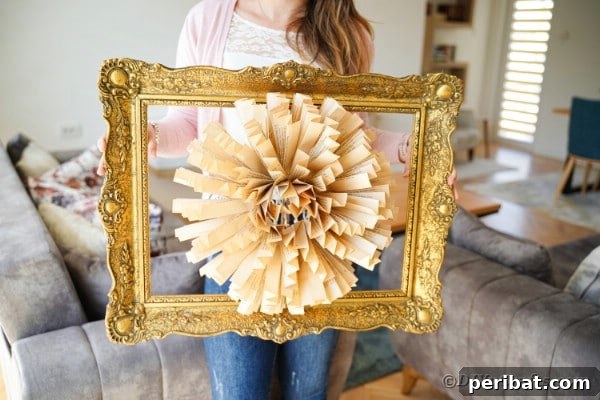 Woman holding old book page paper flower frame art