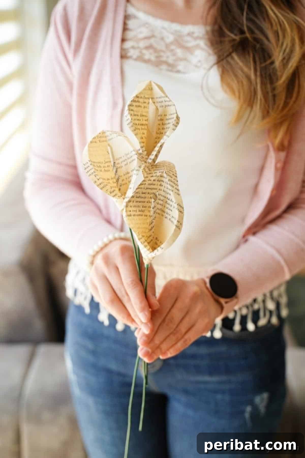 Whispering Pages Calla Lily Bouquet 19 Woman holding book page calla lily