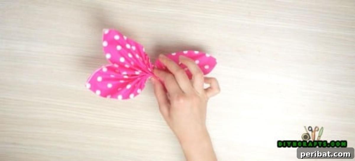 5 Instant Napkin Folds to Amaze Your Guests 14 Butterfly Napkin Step 3 Detail: Arranging the Four Wing Sections