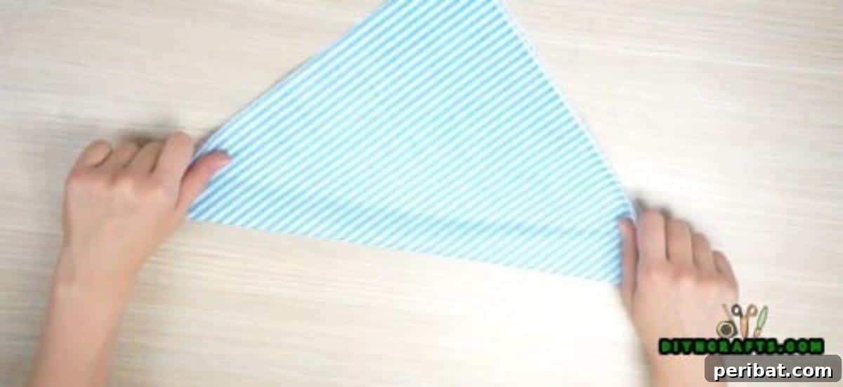 5 Instant Napkin Folds to Amaze Your Guests 3 Fish Napkin Step 2: Diagonal Fold for the Body