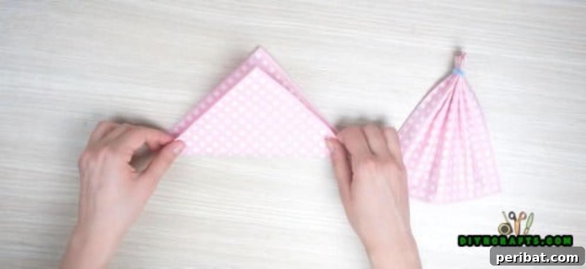 5 Instant Napkin Folds to Amaze Your Guests 24 Dress Napkin Step 3: Folding Second Napkin Diagonally for Bodice Base