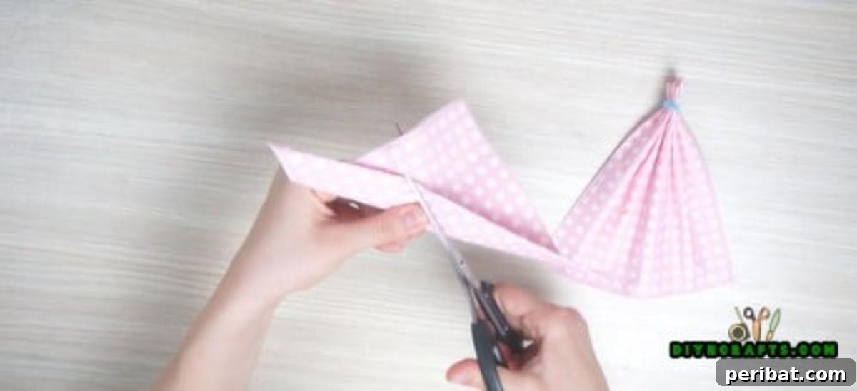 5 Instant Napkin Folds to Amaze Your Guests 27 Dress Napkin Step 5: Cutting Triangle for the Neckline