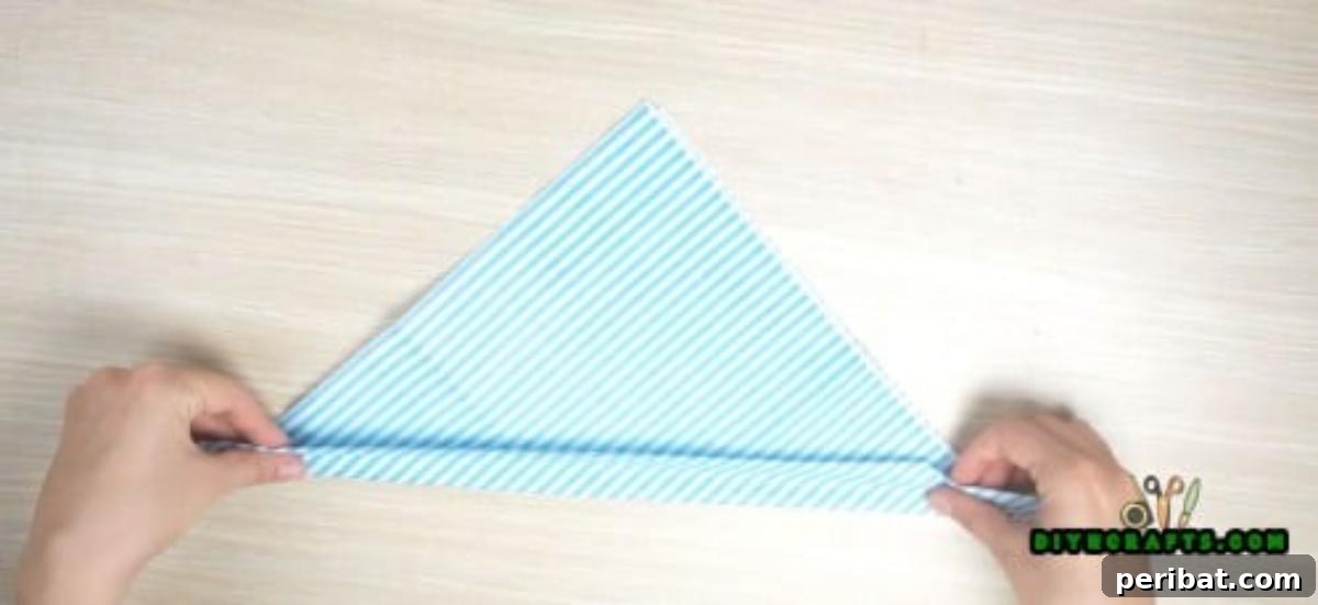 5 Instant Napkin Folds to Amaze Your Guests 4 Fish Napkin Step 3: Folding the Tail Fin Base