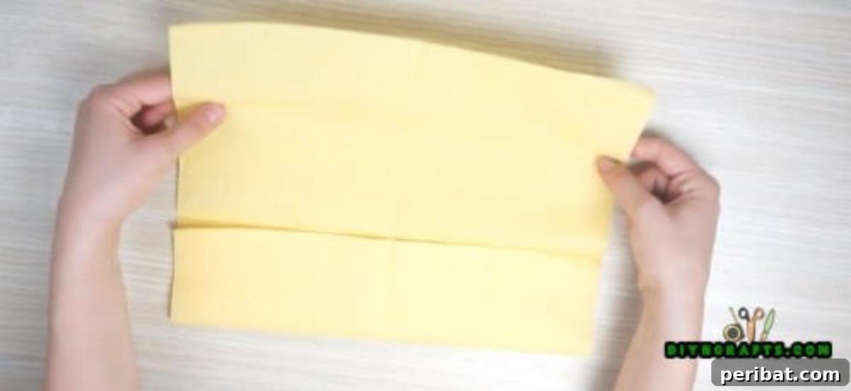 5 Instant Napkin Folds to Amaze Your Guests 32 Shirt Napkin Step 2: Folding Bottom Half to Center