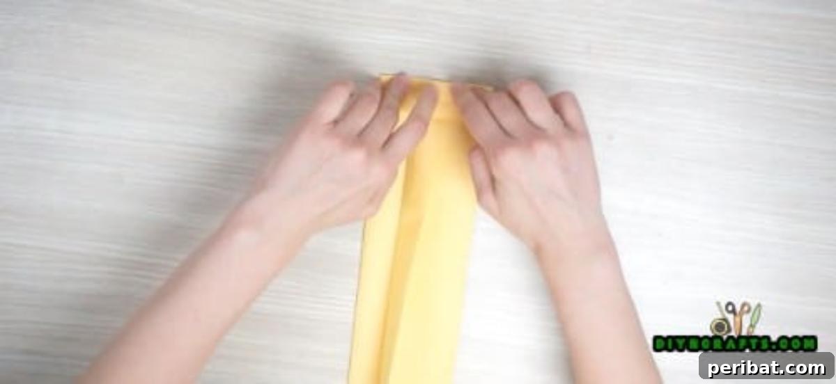 5 Instant Napkin Folds to Amaze Your Guests 35 Shirt Napkin Step 6: Refining Collar Fold Lengthwise