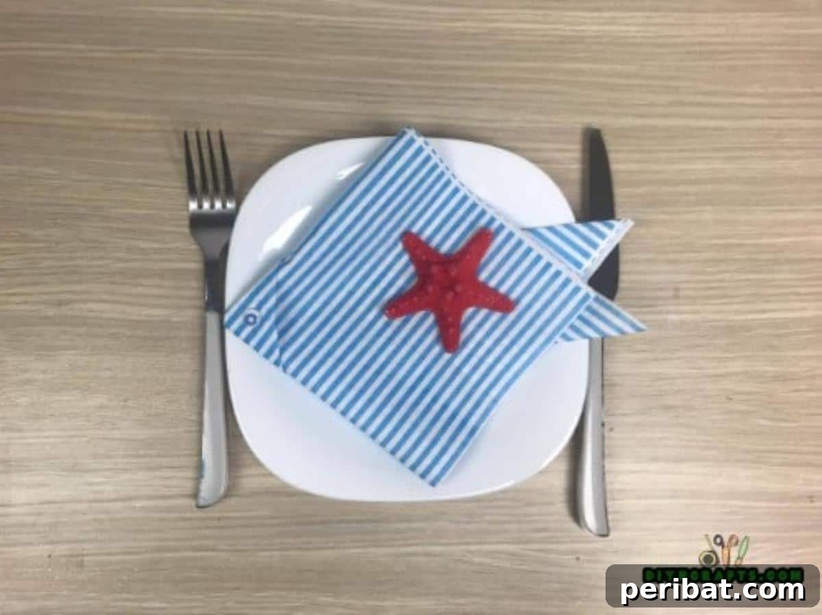 5 Instant Napkin Folds to Amaze Your Guests 9 Completed Fish Napkin Fold for Table Decor